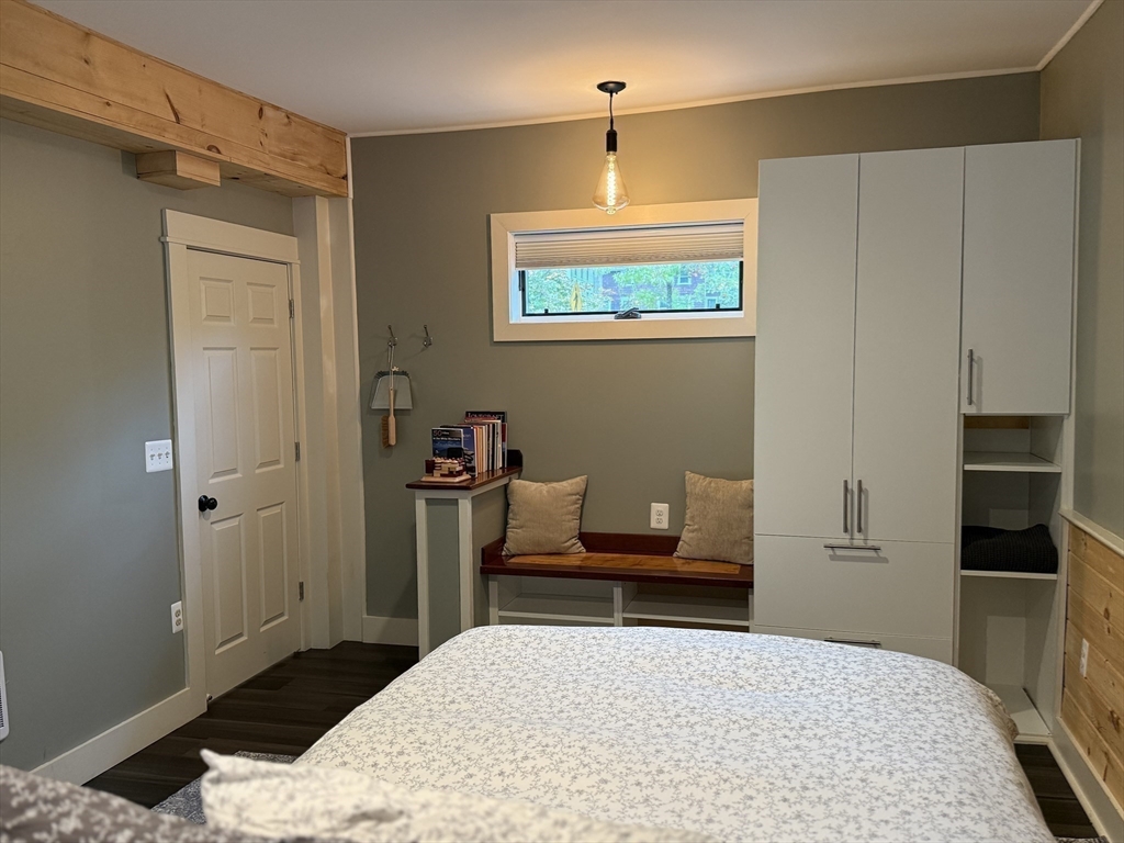 5 Bridge Street Montague, MA 01349 - Photo 9 of 36 a bedroom with a bed and a window