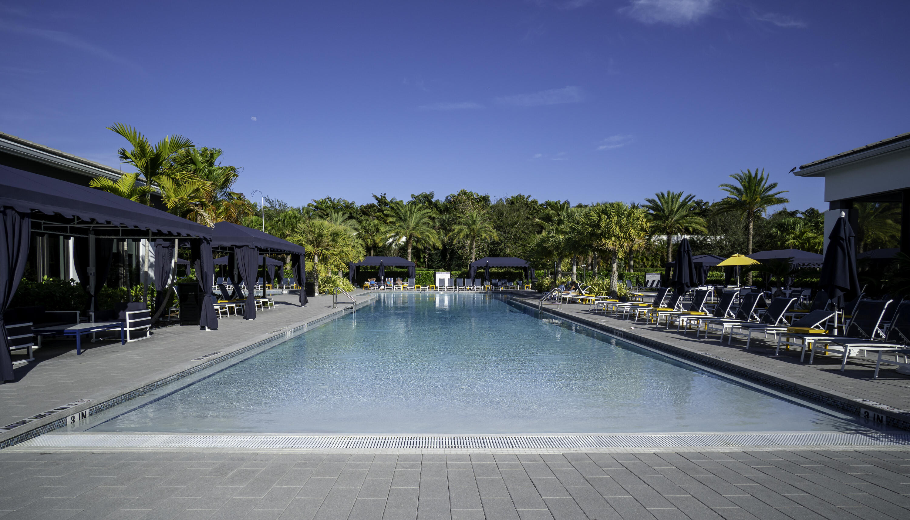 17081 Five Waters Avenue Boca Raton, FL 33496 - Photo 105 of 109 a view of a swimming pool with a patio