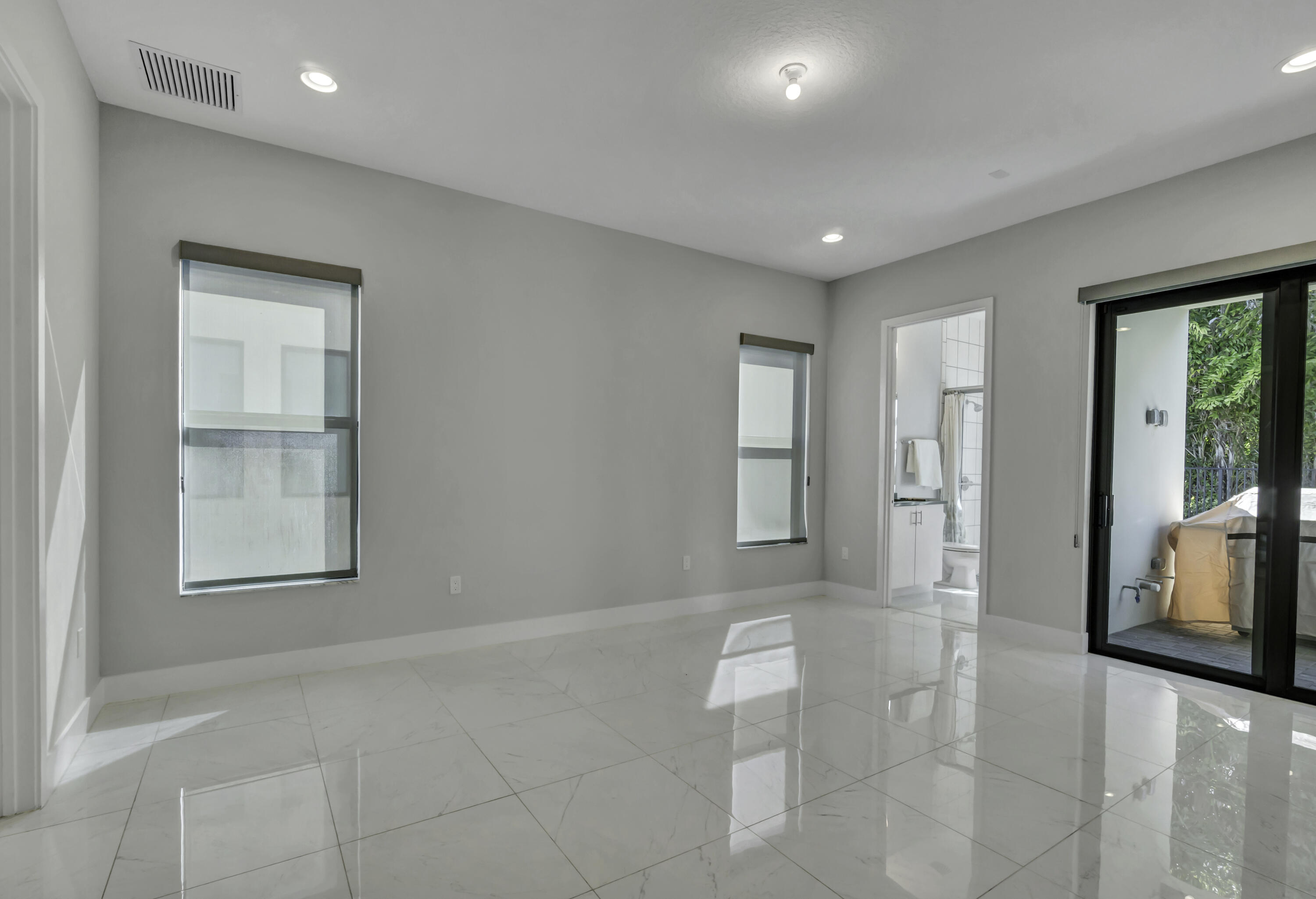 17081 Five Waters Avenue Boca Raton, FL 33496 - Photo 38 of 109 a bathroom with a sink and a mirror