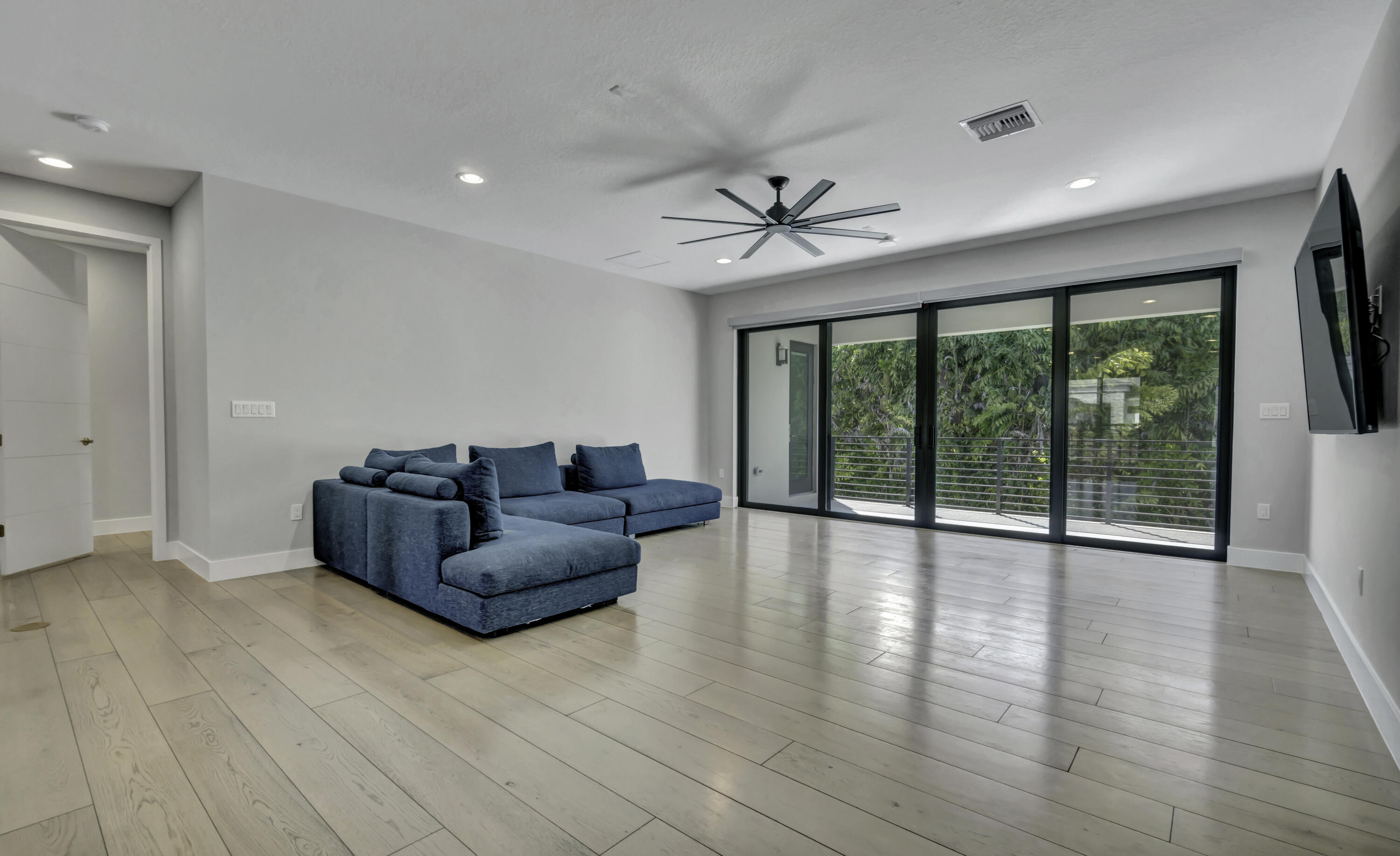 17081 Five Waters Avenue Boca Raton, FL 33496 - Photo 46 of 109 a living room with furniture and a large window
