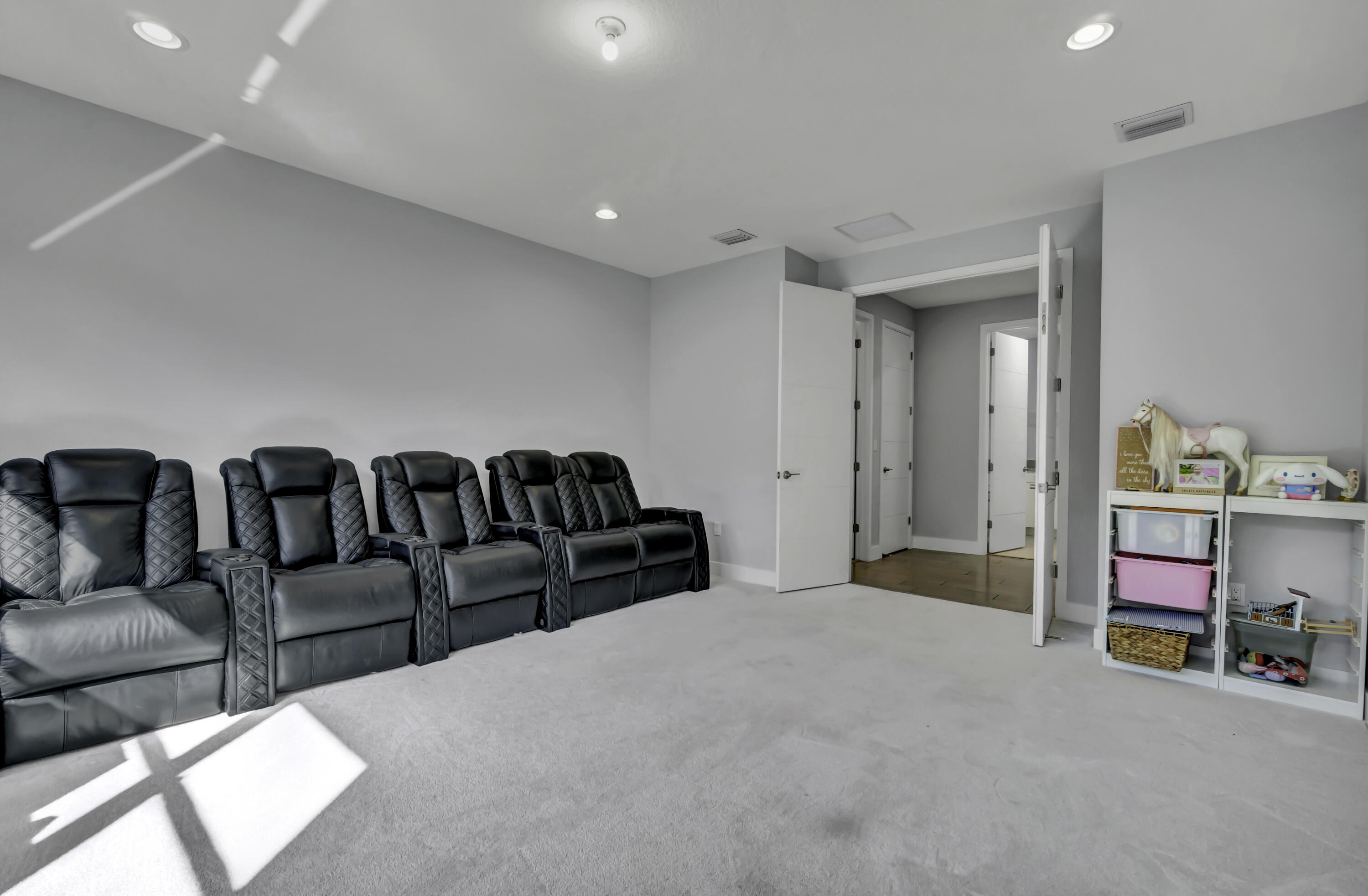 17081 Five Waters Avenue Boca Raton, FL 33496 - Photo 51 of 109 a large bedroom with a bed and a couch