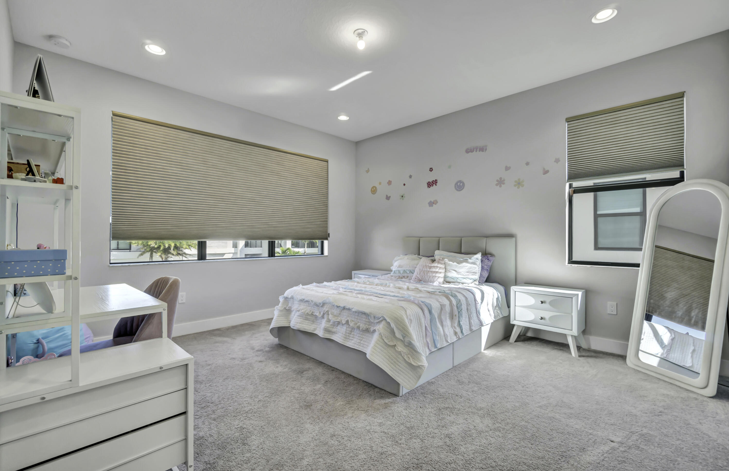 17081 Five Waters Avenue Boca Raton, FL 33496 - Photo 64 of 109 a spacious bedroom with a large bed and a large window