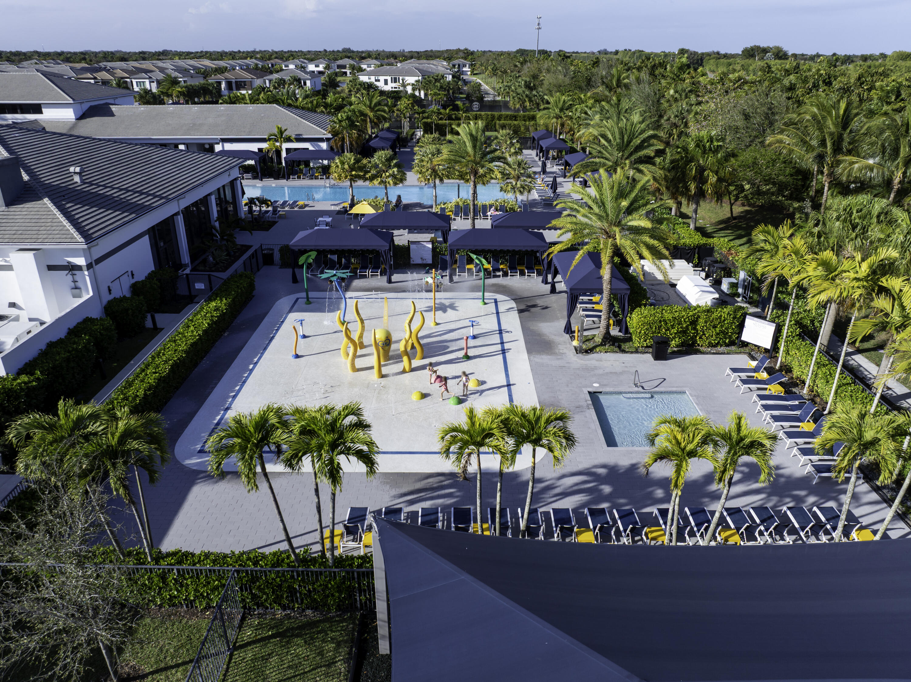 17081 Five Waters Avenue Boca Raton, FL 33496 - Photo 81 of 109 an aerial view of a house with a garden and swimming pool