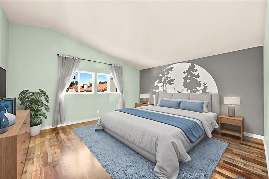 40219 Donomore Court Temecula, CA 92591 - Photo 30 of 63 a bedroom with a large bed and a chandelier