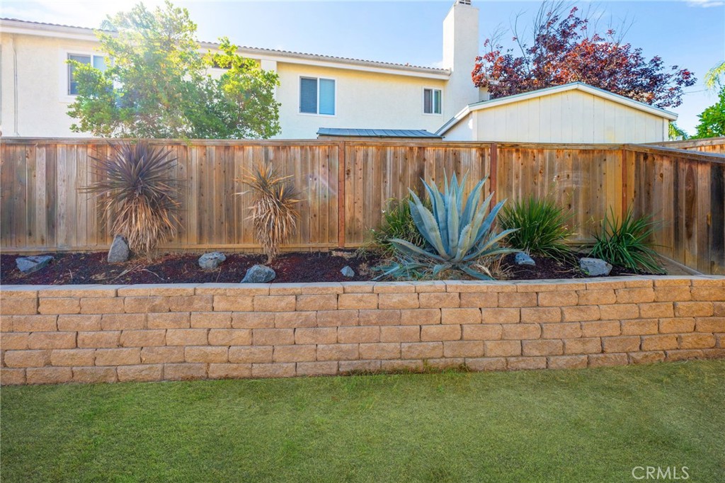 40219 Donomore Court Temecula, CA 92591 - Photo 47 of 63 a view of a backyard with a garden