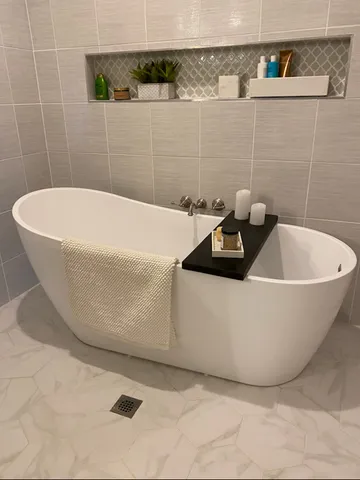 a view of entryway with wooden floor and windows