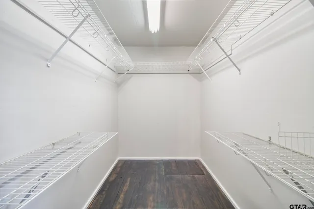 a view of a room with racks on the wall