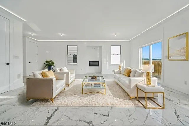 a living room with furniture and a couch