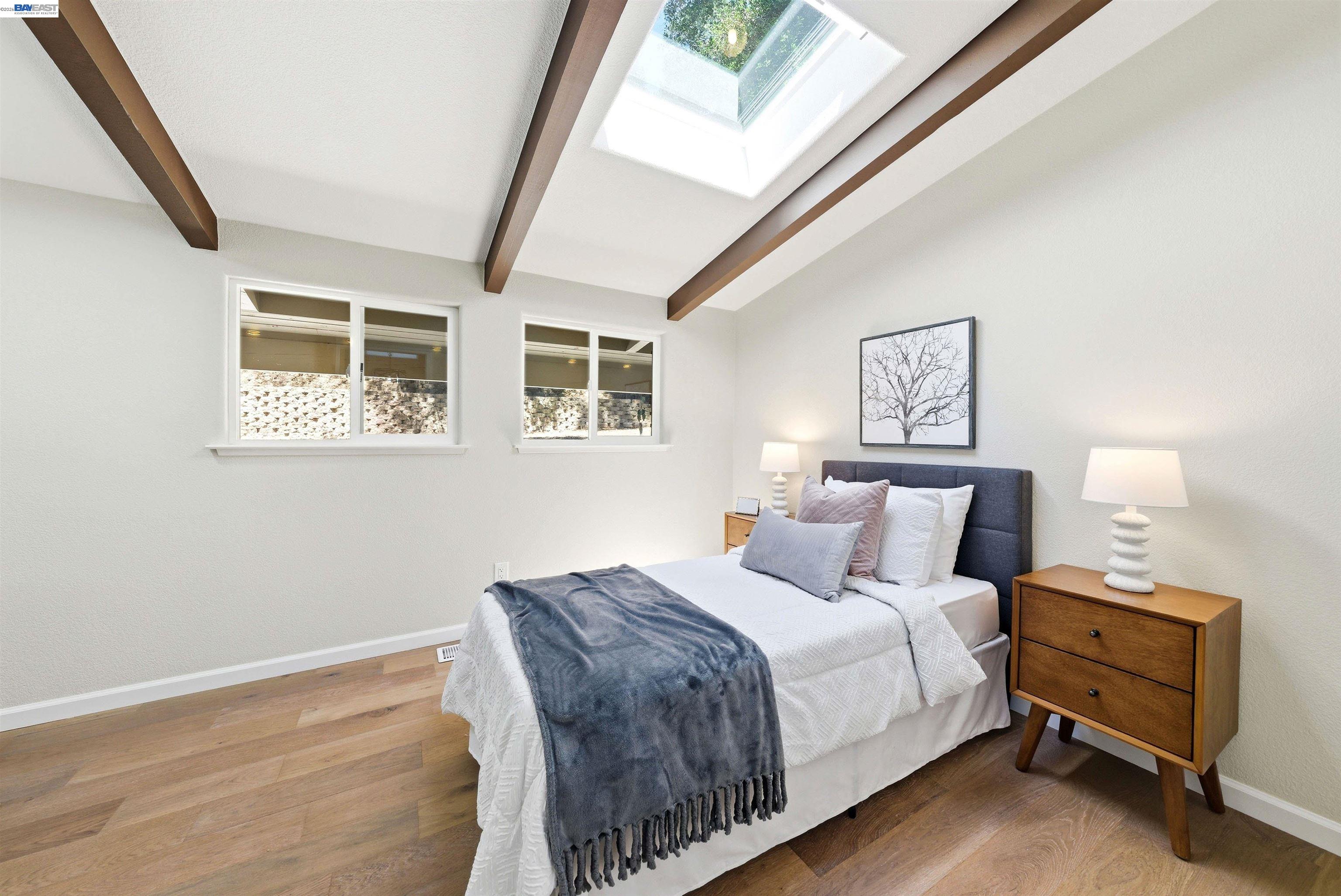 1929 Kilkare Road Sunol, CA 94586 - Photo 16 of 24 a bedroom with a bed and a window