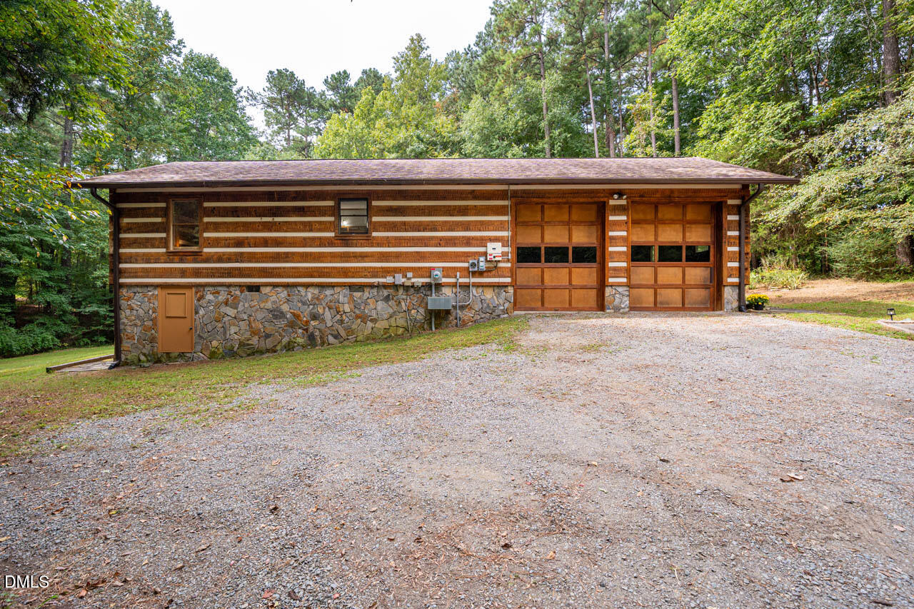 1114 Phil's Ridge Road Chapel Hill, NC 27516 - Photo 27 of 52 Side View of Main Home