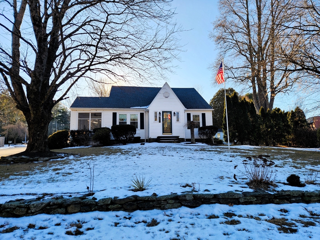 350 Thompson Road Webster, MA 01570 - Photo 1 of 41 a front view of a house with a yard covered with snow