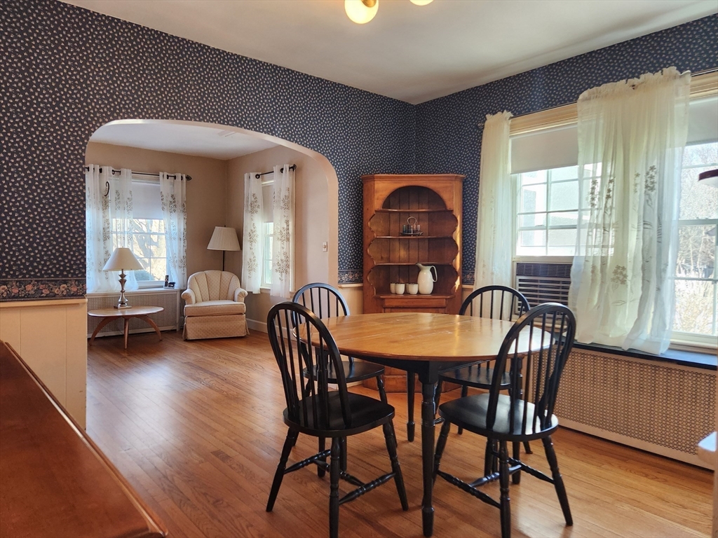 350 Thompson Road Webster, MA 01570 - Photo 15 of 41 a view of a dining room with furniture and wooden floor