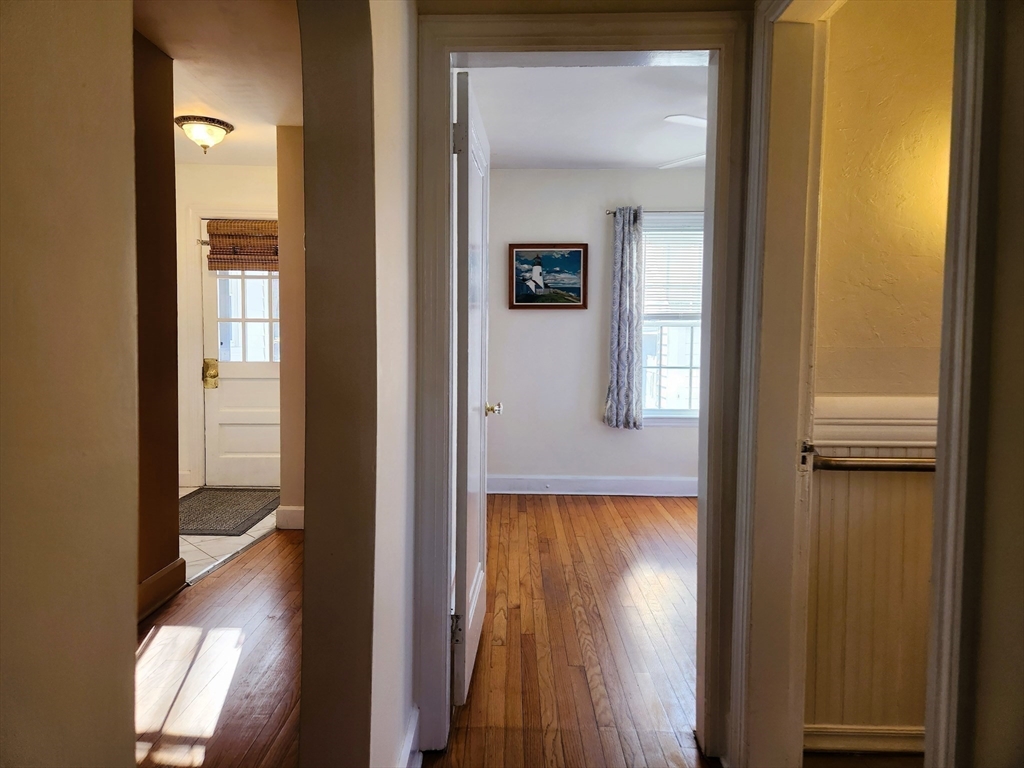 350 Thompson Road Webster, MA 01570 - Photo 22 of 41 a view of a hallway with wooden floor and closet