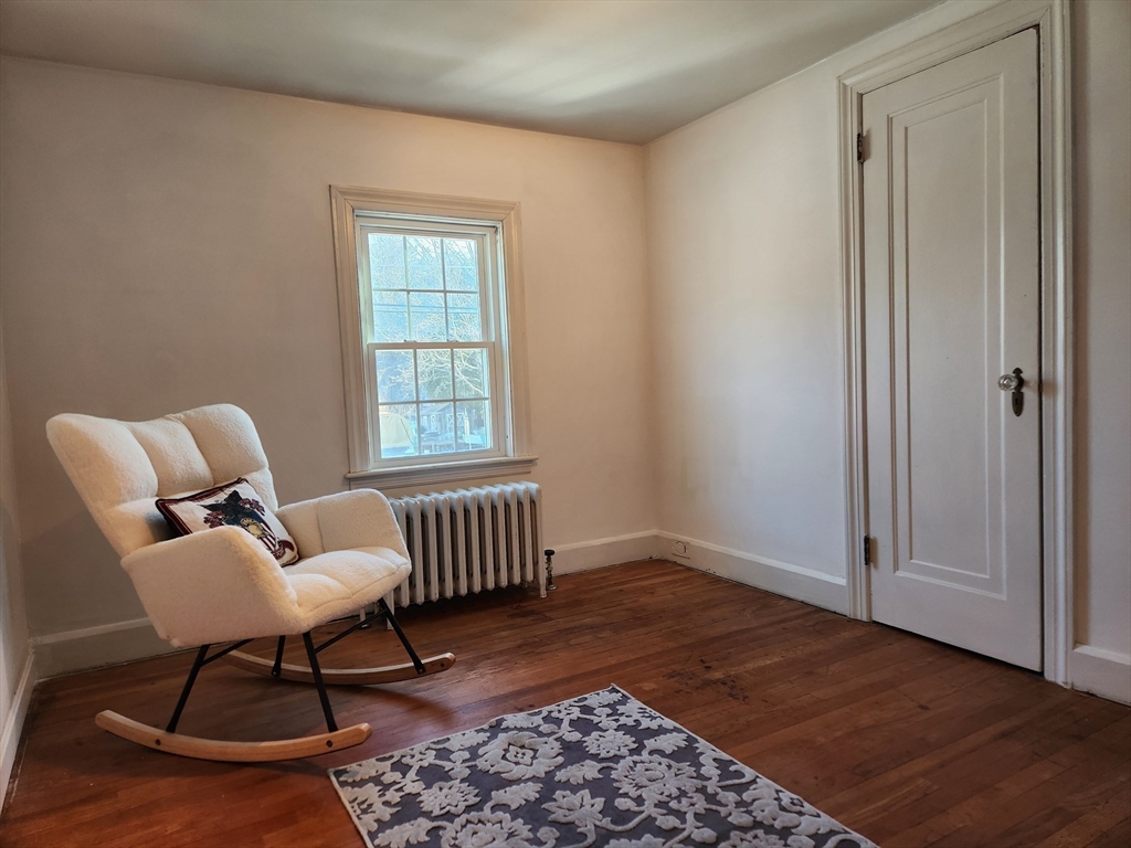 350 Thompson Road Webster, MA 01570 - Photo 25 of 41 a living room with furniture and a window