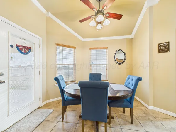 a utility room with sink dryer and washer