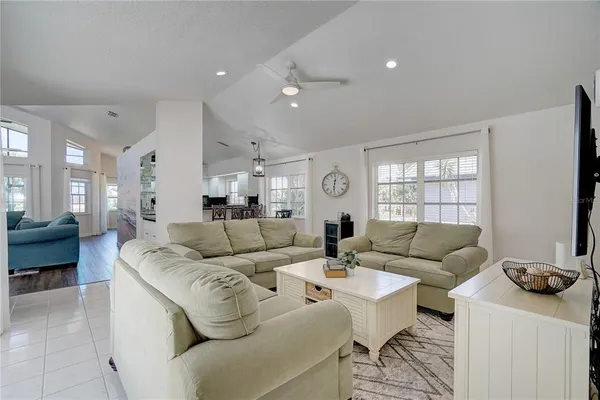 a living room with furniture and a couch