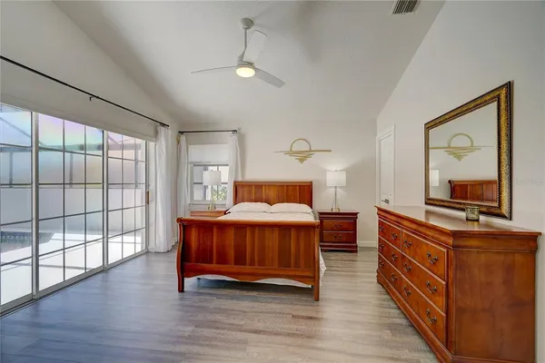 a bed room with a bed and a dresser