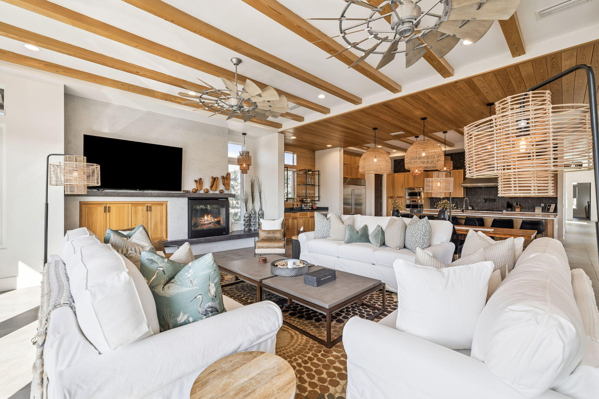124 Hilltop Drive Santa Rosa Beach, FL 32459 - Photo 11 of 65 a living room with furniture a flat screen tv and a chandelier