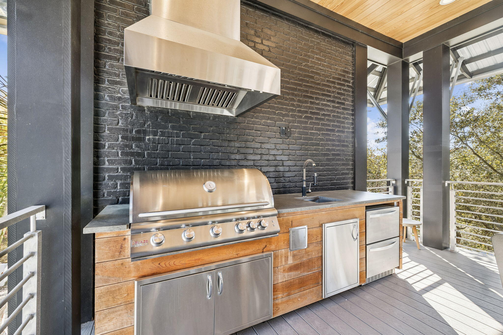 124 Hilltop Drive Santa Rosa Beach, FL 32459 - Photo 15 of 65 a kitchen with a stove and white cabinets