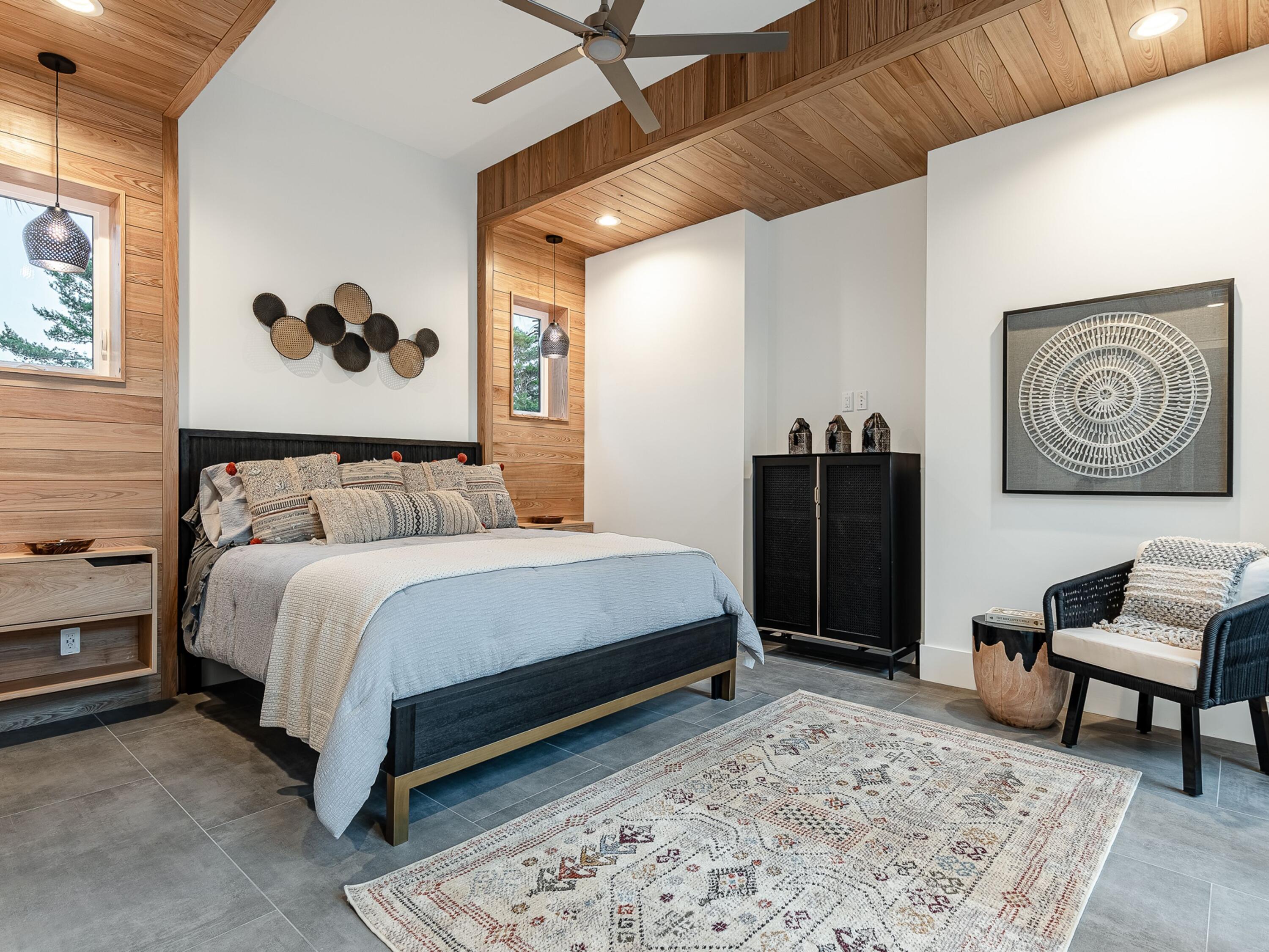 124 Hilltop Drive Santa Rosa Beach, FL 32459 - Photo 22 of 65 a bedroom with a bed and painting on the wall