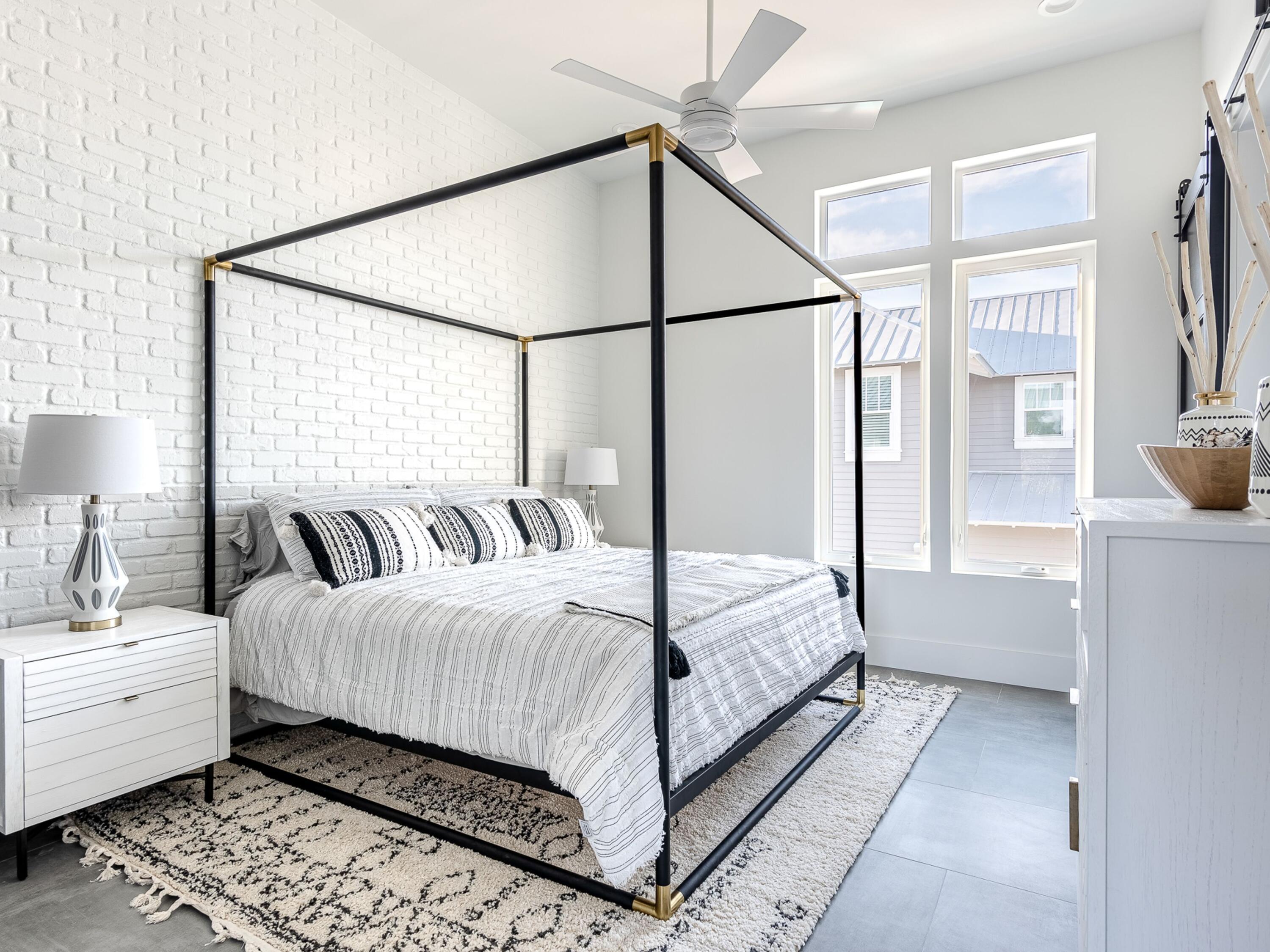 124 Hilltop Drive Santa Rosa Beach, FL 32459 - Photo 26 of 65 a bedroom with a large bed and a window