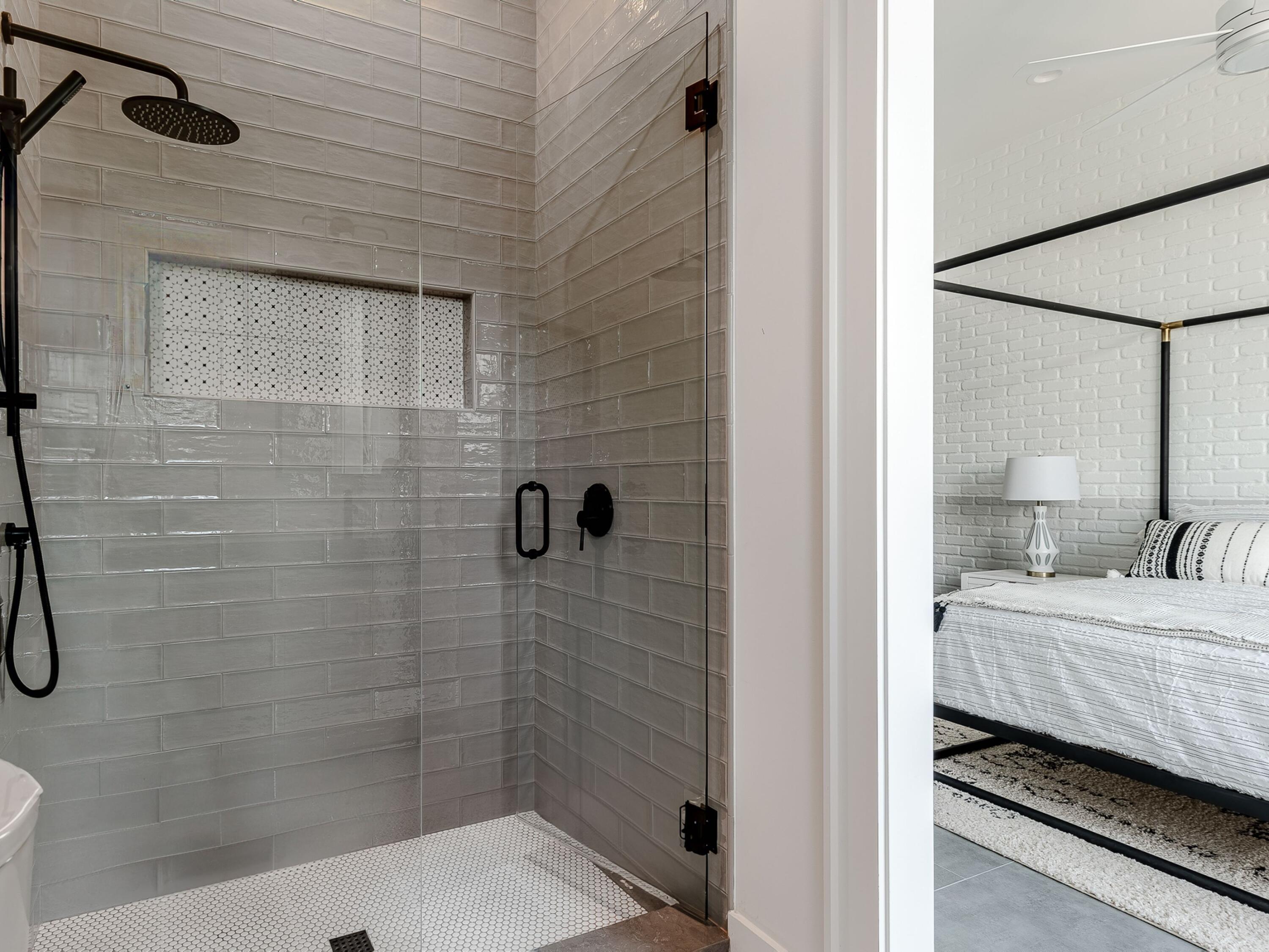 124 Hilltop Drive Santa Rosa Beach, FL 32459 - Photo 27 of 65 a bathroom with a sink a shower and a mirror