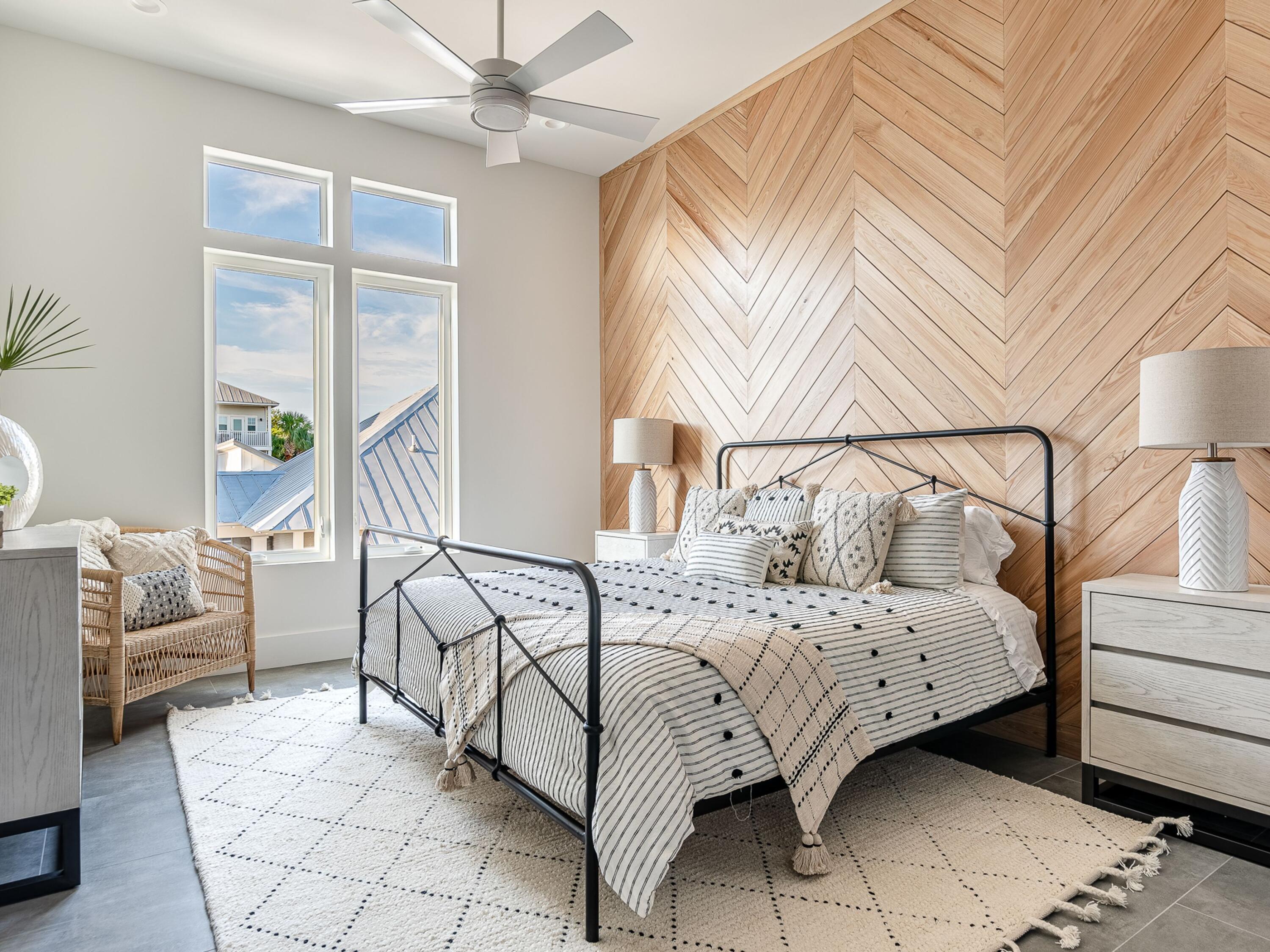 124 Hilltop Drive Santa Rosa Beach, FL 32459 - Photo 28 of 65 a bedroom with a bed and white walls with outer view