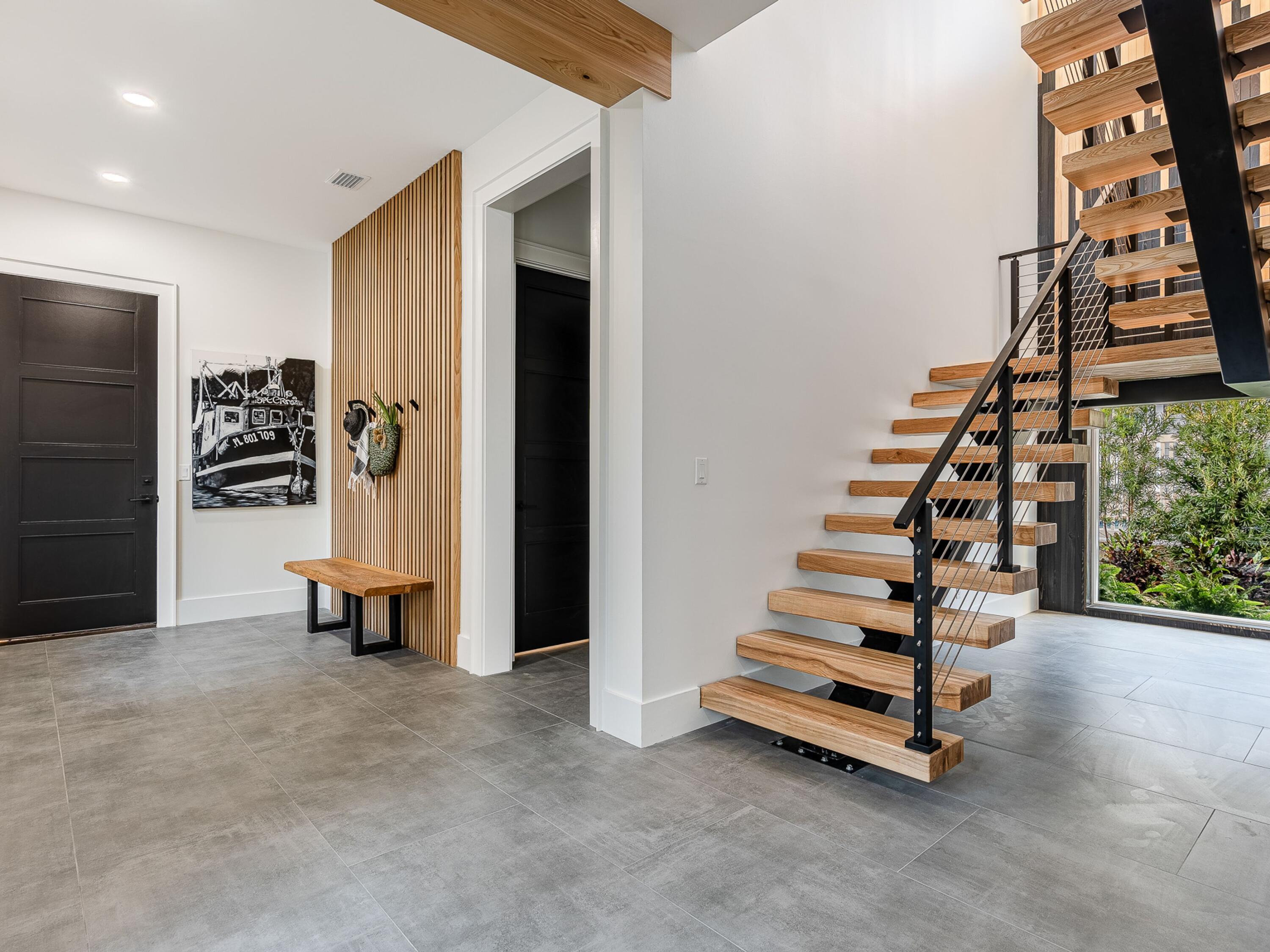124 Hilltop Drive Santa Rosa Beach, FL 32459 - Photo 34 of 65 an empty room with windows and stairs