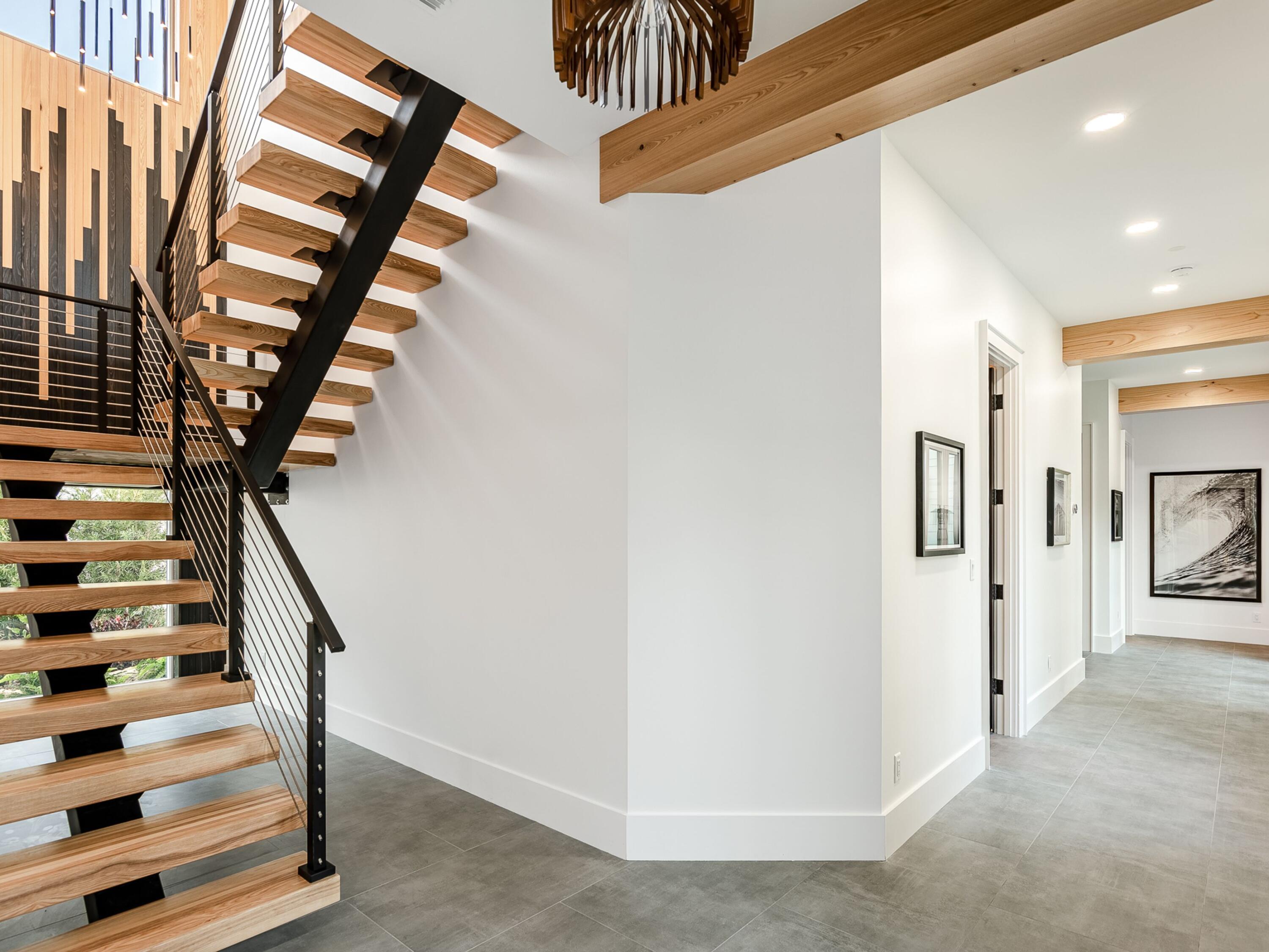 124 Hilltop Drive Santa Rosa Beach, FL 32459 - Photo 35 of 65 a view of entryway with wooden floor and stairs