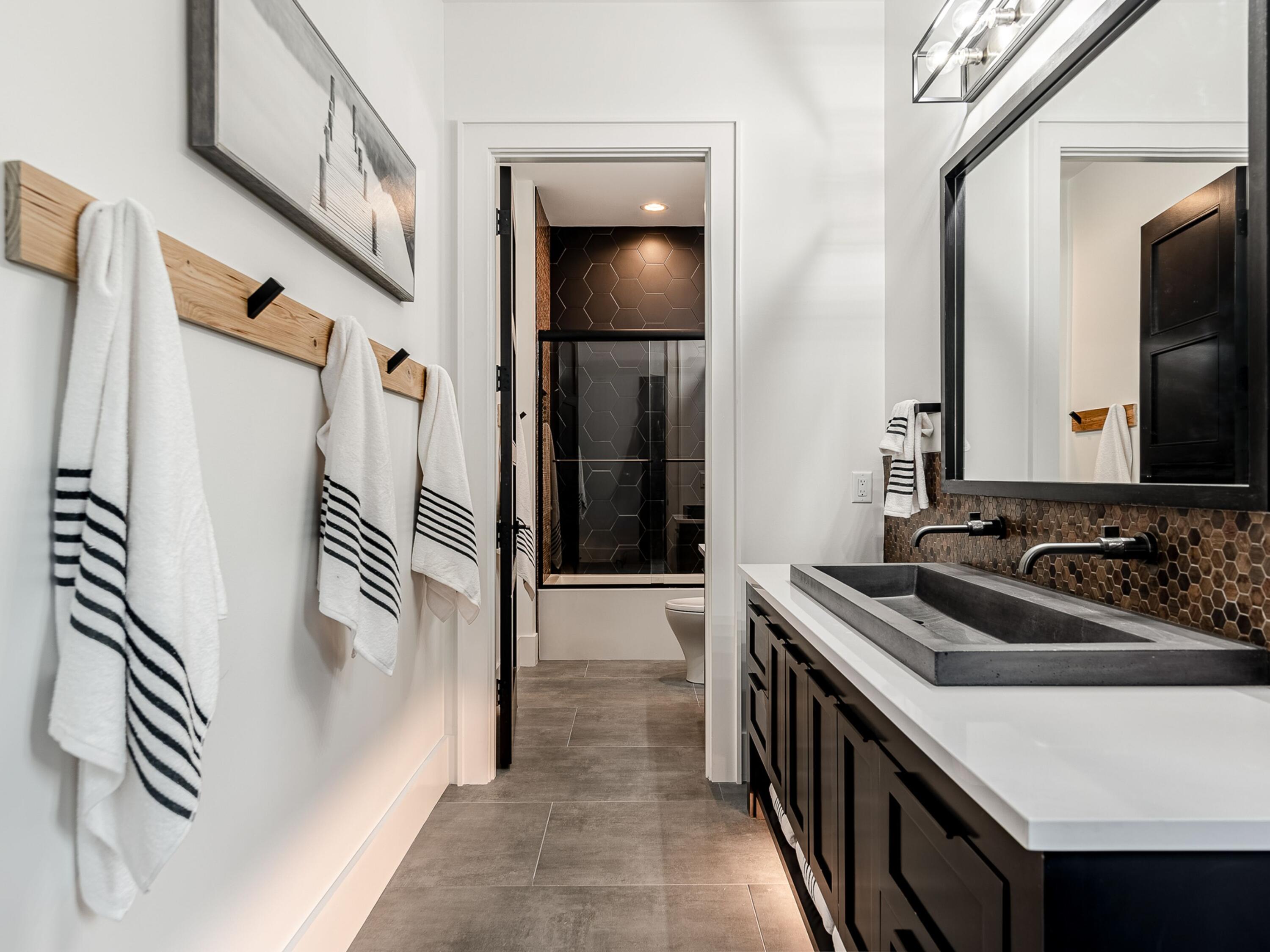 124 Hilltop Drive Santa Rosa Beach, FL 32459 - Photo 38 of 65 a bathroom with a sink and a mirror