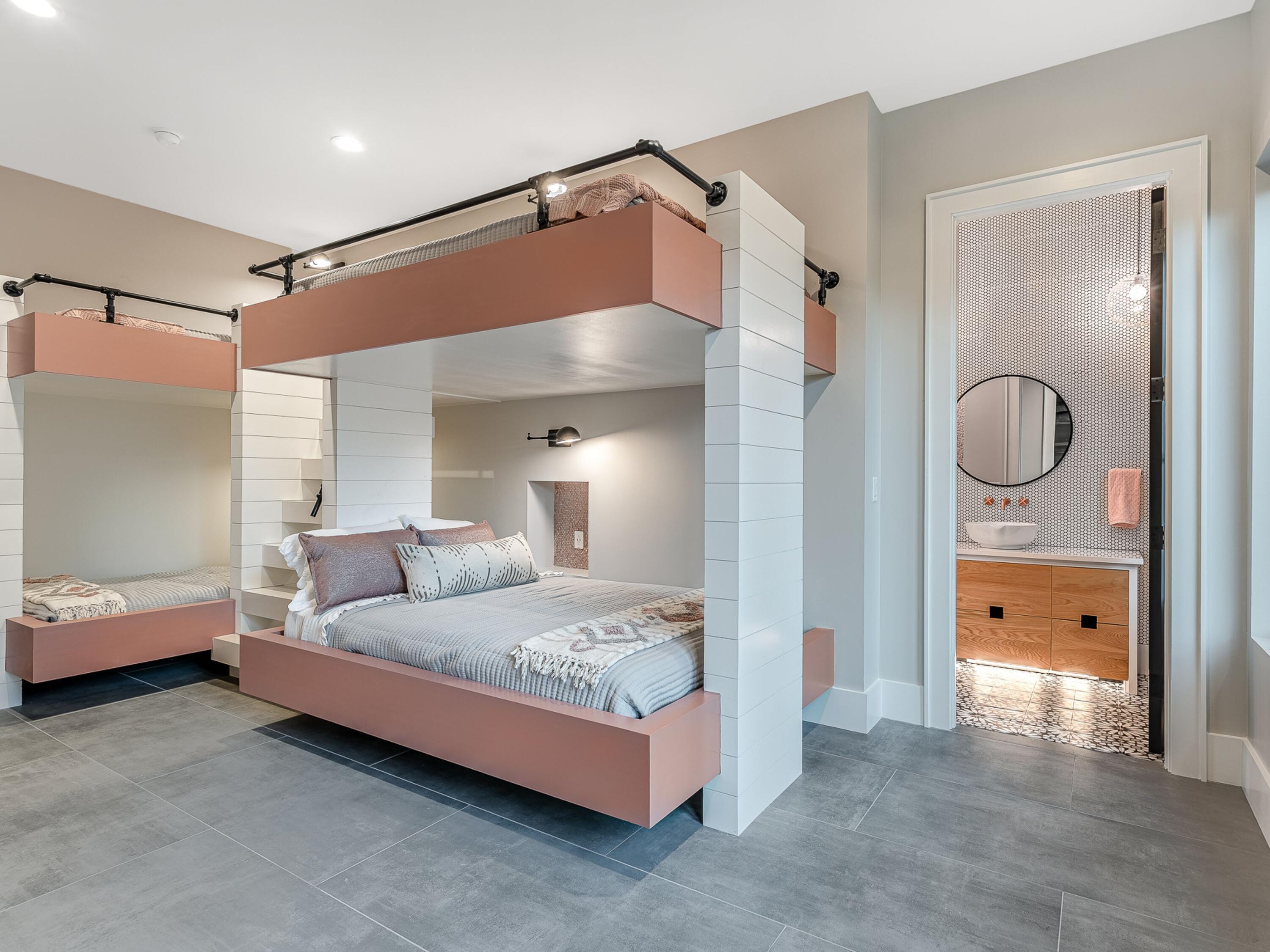 124 Hilltop Drive Santa Rosa Beach, FL 32459 - Photo 41 of 65 a bedroom with a bed and a mirror