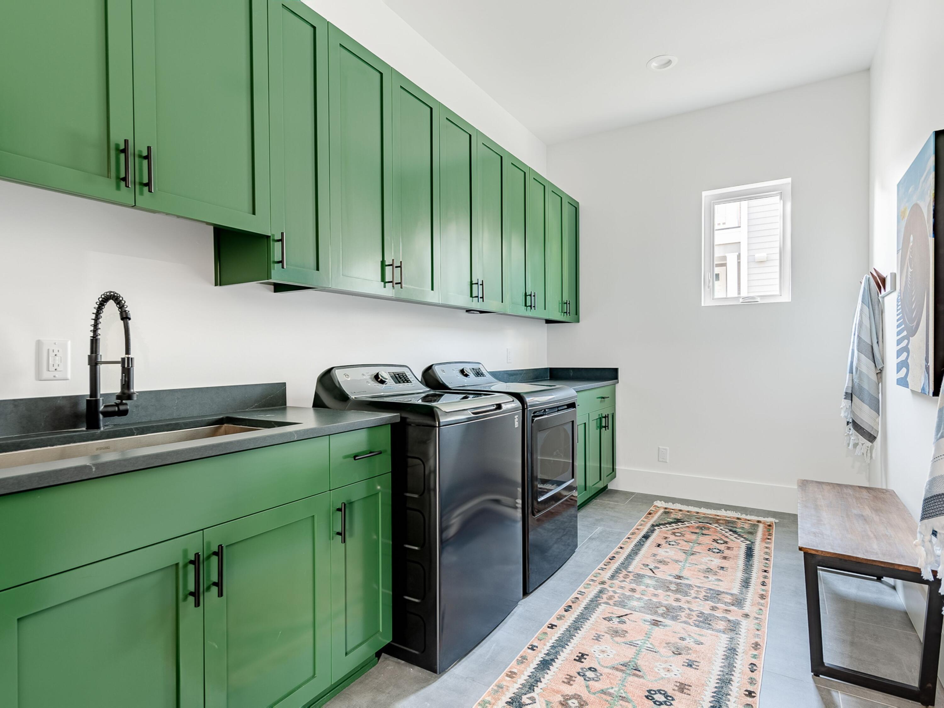 124 Hilltop Drive Santa Rosa Beach, FL 32459 - Photo 47 of 65 a kitchen with stainless steel appliances granite countertop a sink a stove and cabinets