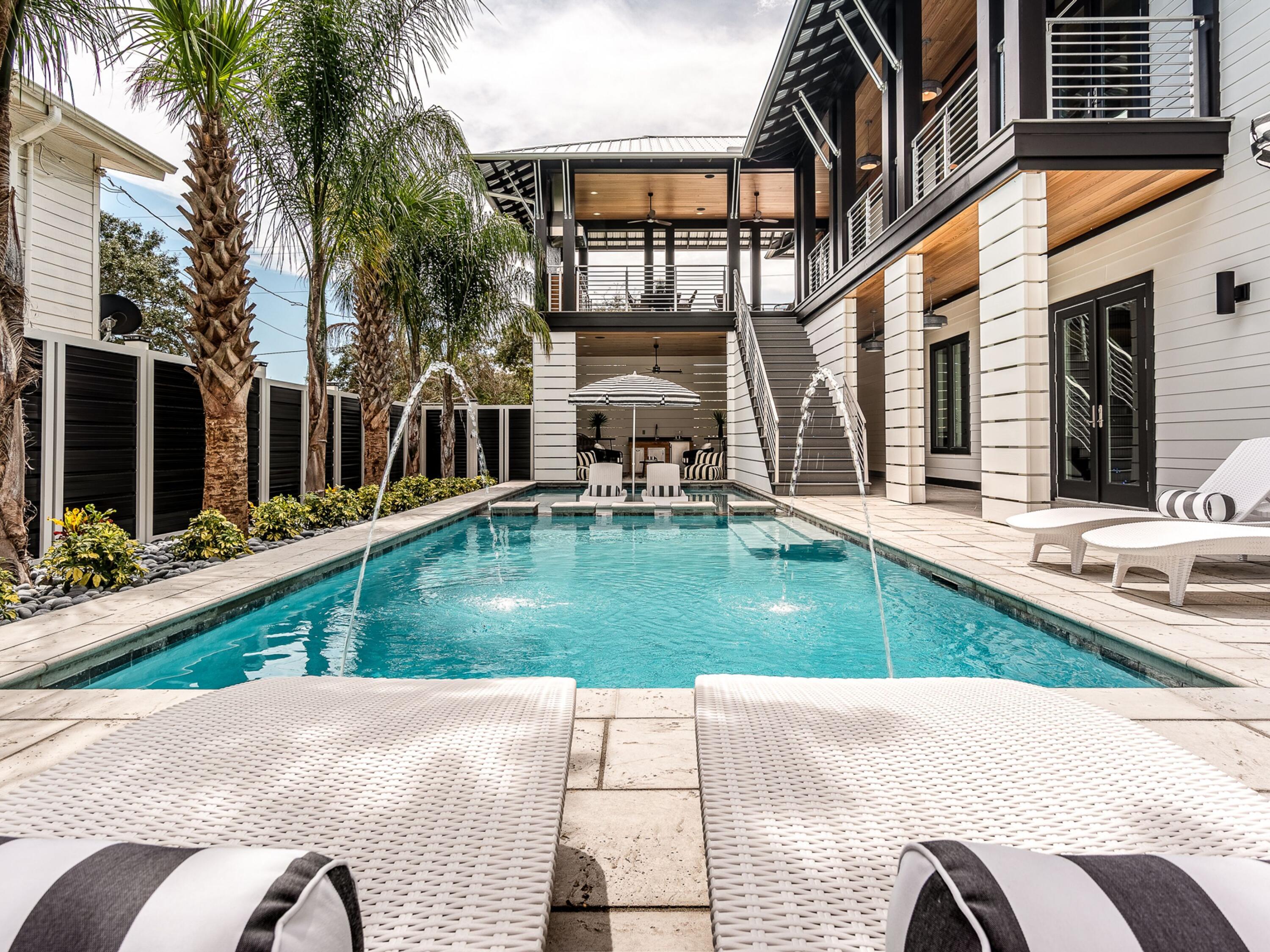 124 Hilltop Drive Santa Rosa Beach, FL 32459 - Photo 55 of 65 a view of a house with backyard and sitting area