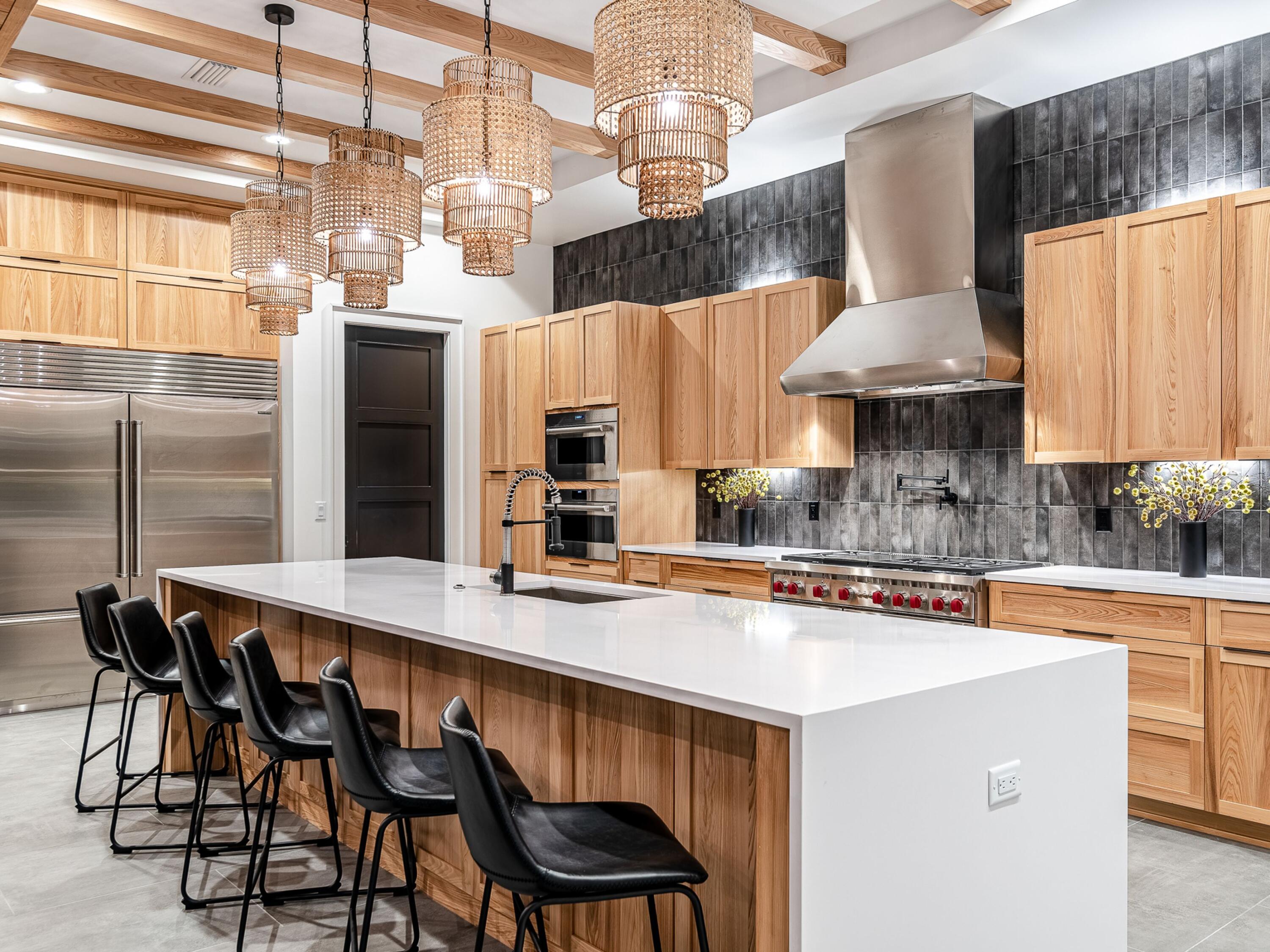 124 Hilltop Drive Santa Rosa Beach, FL 32459 - Photo 6 of 65 a kitchen with stainless steel appliances a sink and a table