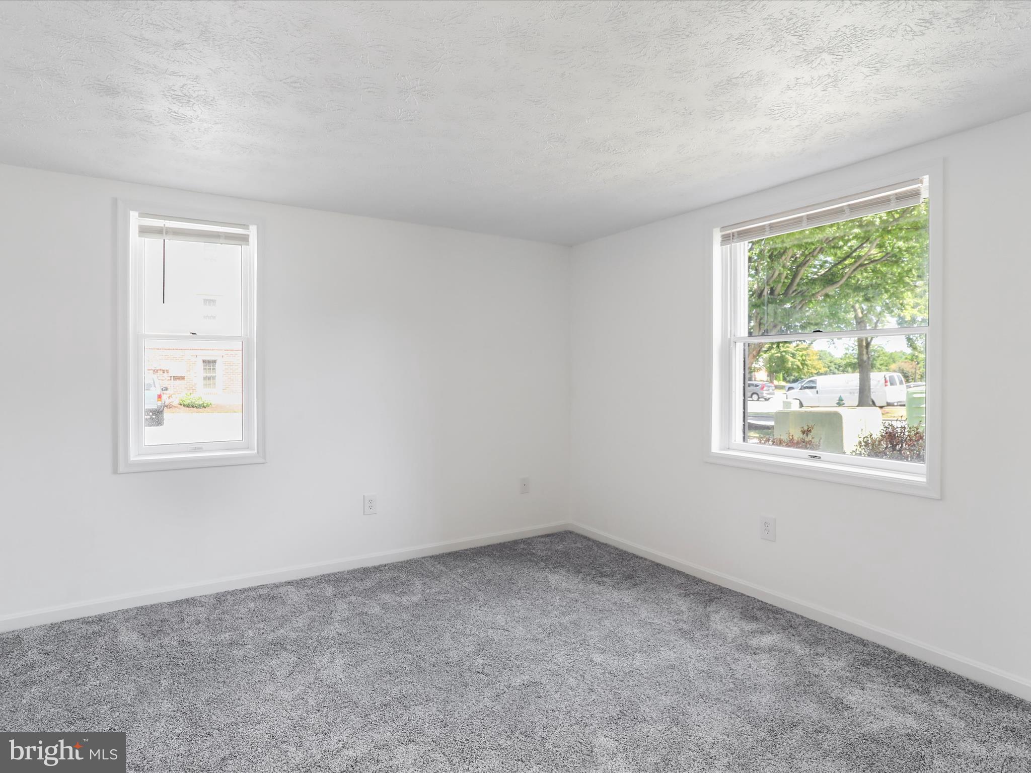 811 Stratford Way, Unit D Frederick, MD 21701 - Photo 17 of 25 an empty room with windows