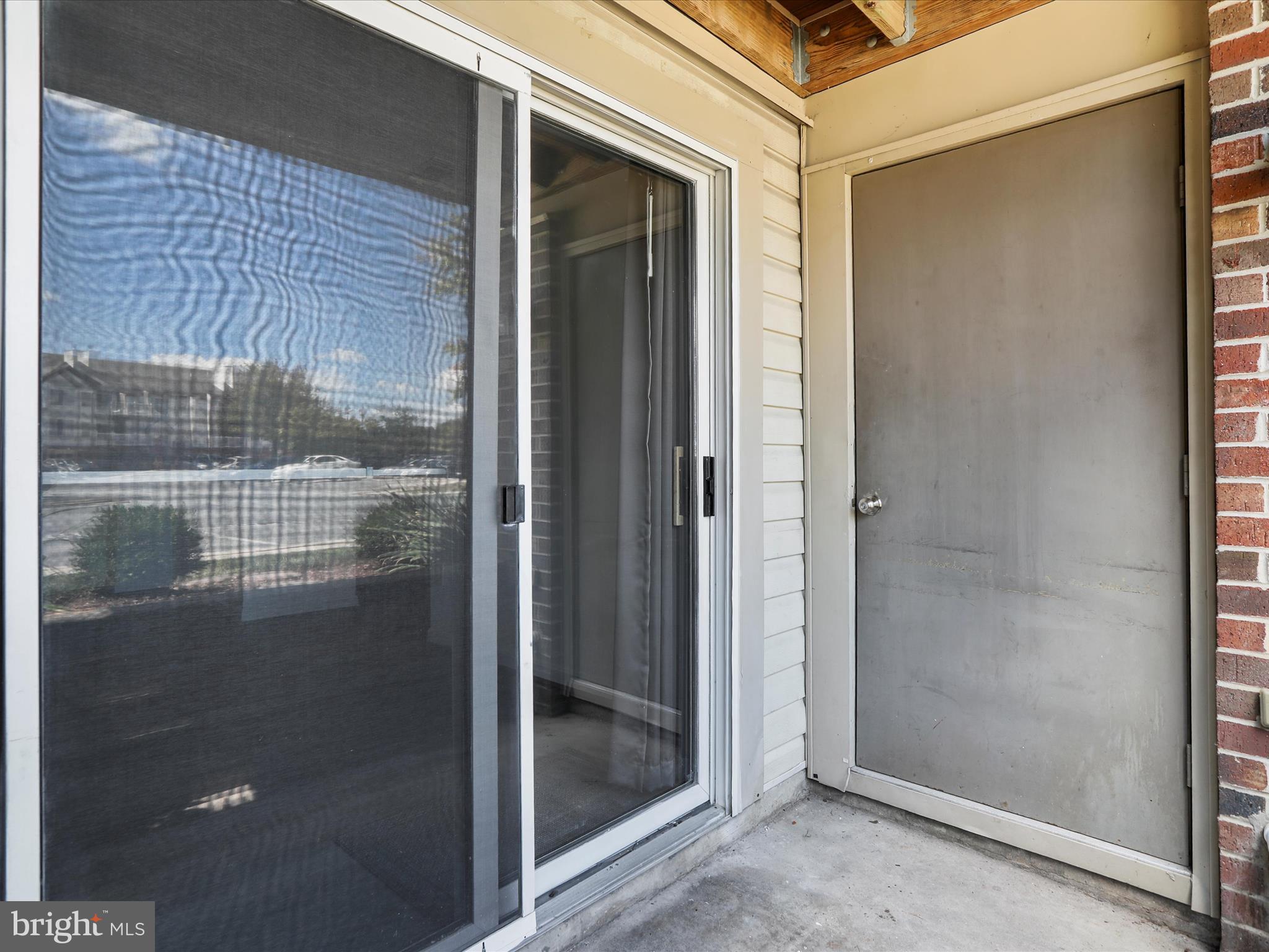 811 Stratford Way, Unit D Frederick, MD 21701 - Photo 2 of 25 a bathroom with a glass shower door