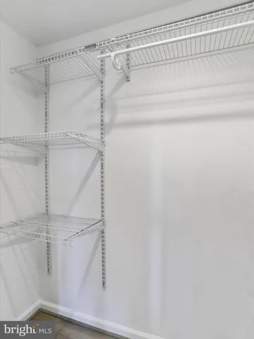 a kitchen with a refrigerator stove and microwave