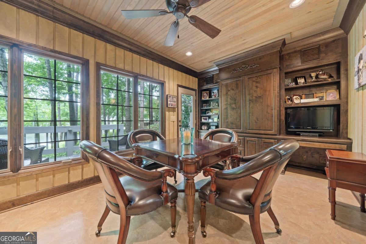 1031 Old Still Road Greensboro, GA 30642 - Photo 62 of 73 a dining room with furniture window and outside view