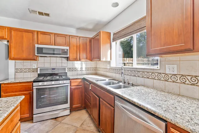a view of kitchen island with wooden floor