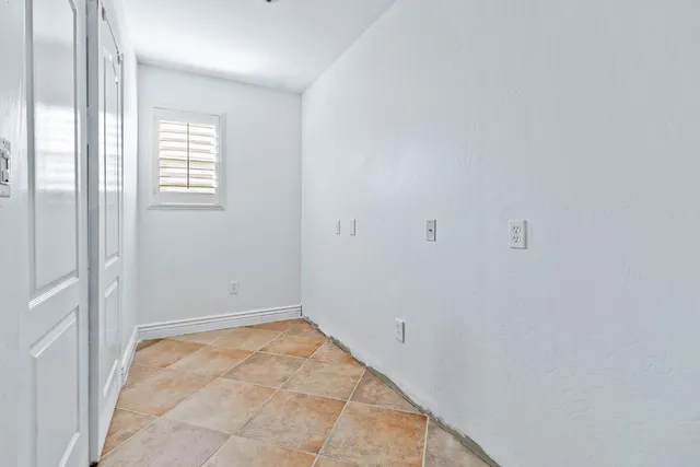 a view of staircase with wooden floor