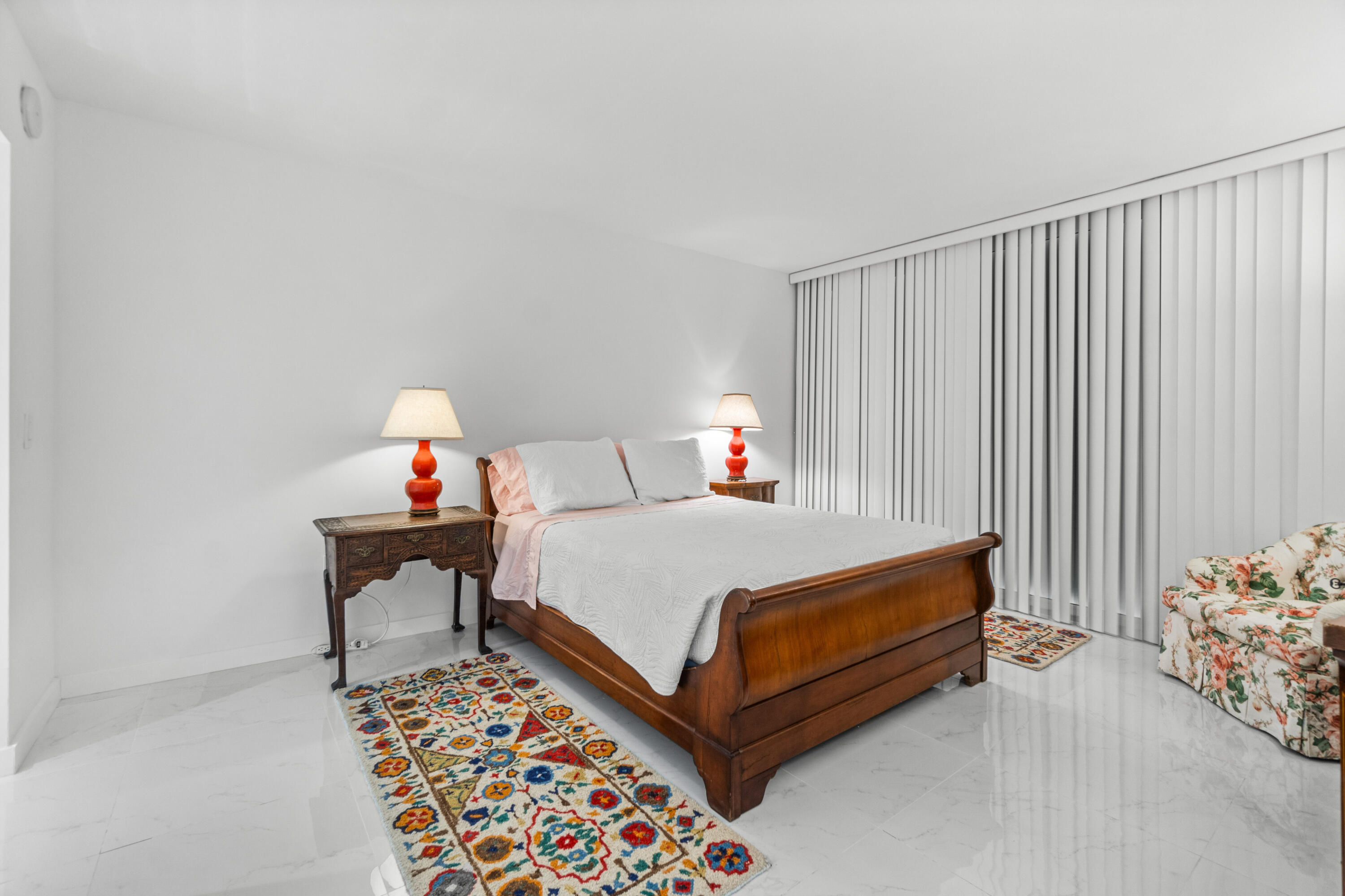 2780 South Ocean Boulevard, Unit 306 Palm Beach, FL 33480 - Photo 16 of 37 a bedroom with a bed and a window