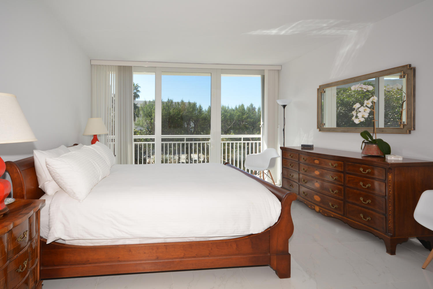 2780 South Ocean Boulevard, Unit 306 Palm Beach, FL 33480 - Photo 19 of 37 a bedroom with a bed and a window