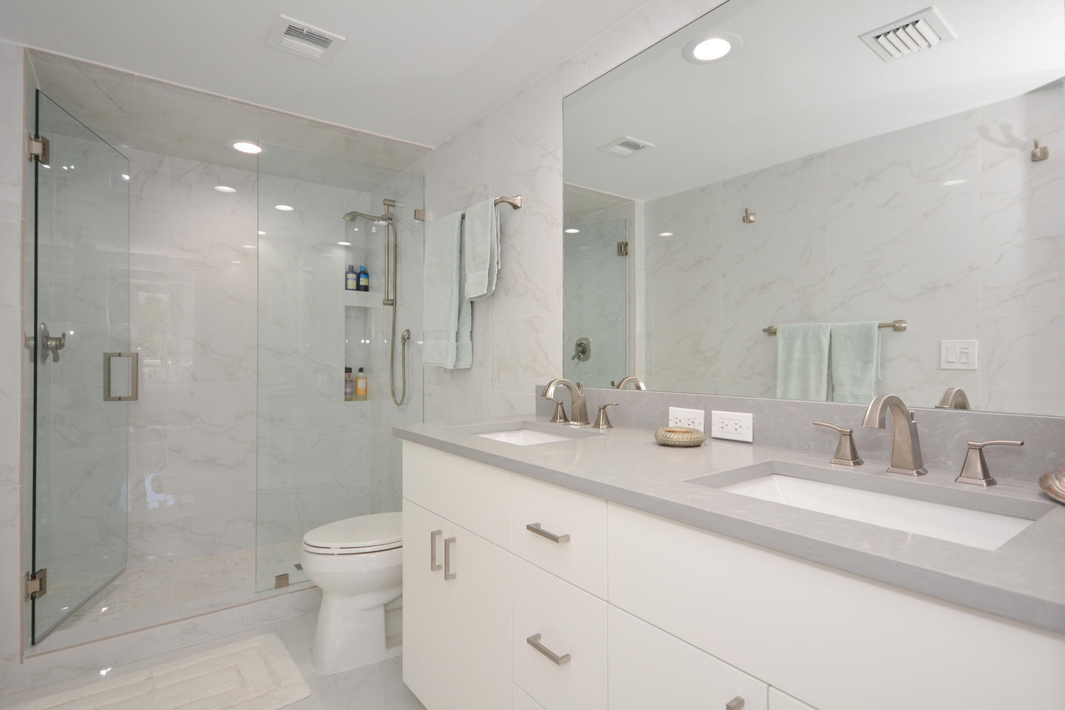2780 South Ocean Boulevard, Unit 306 Palm Beach, FL 33480 - Photo 21 of 37 a bathroom with a sink a toilet and shower