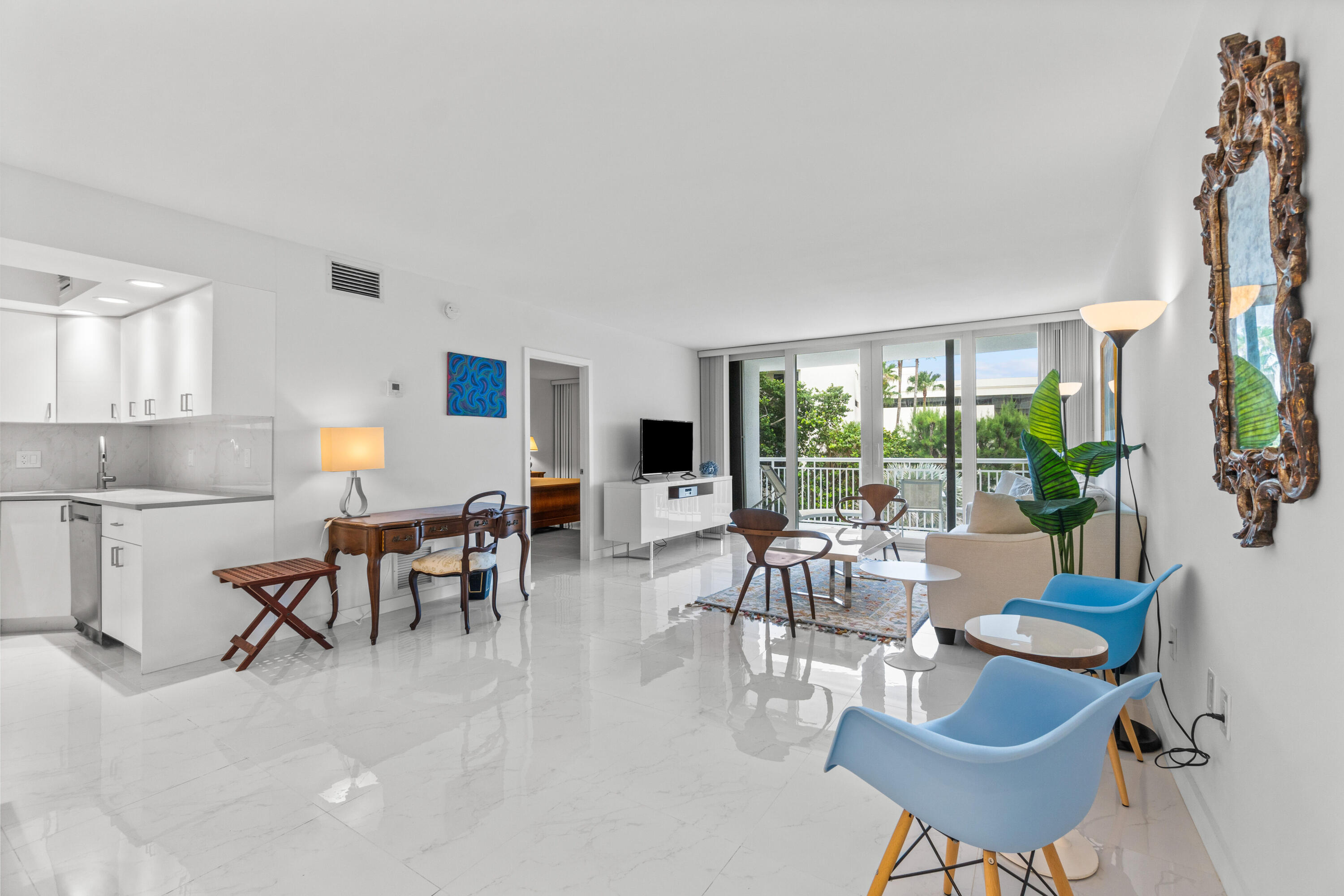 2780 South Ocean Boulevard, Unit 306 Palm Beach, FL 33480 - Photo 5 of 37 a living room with furniture and a large window