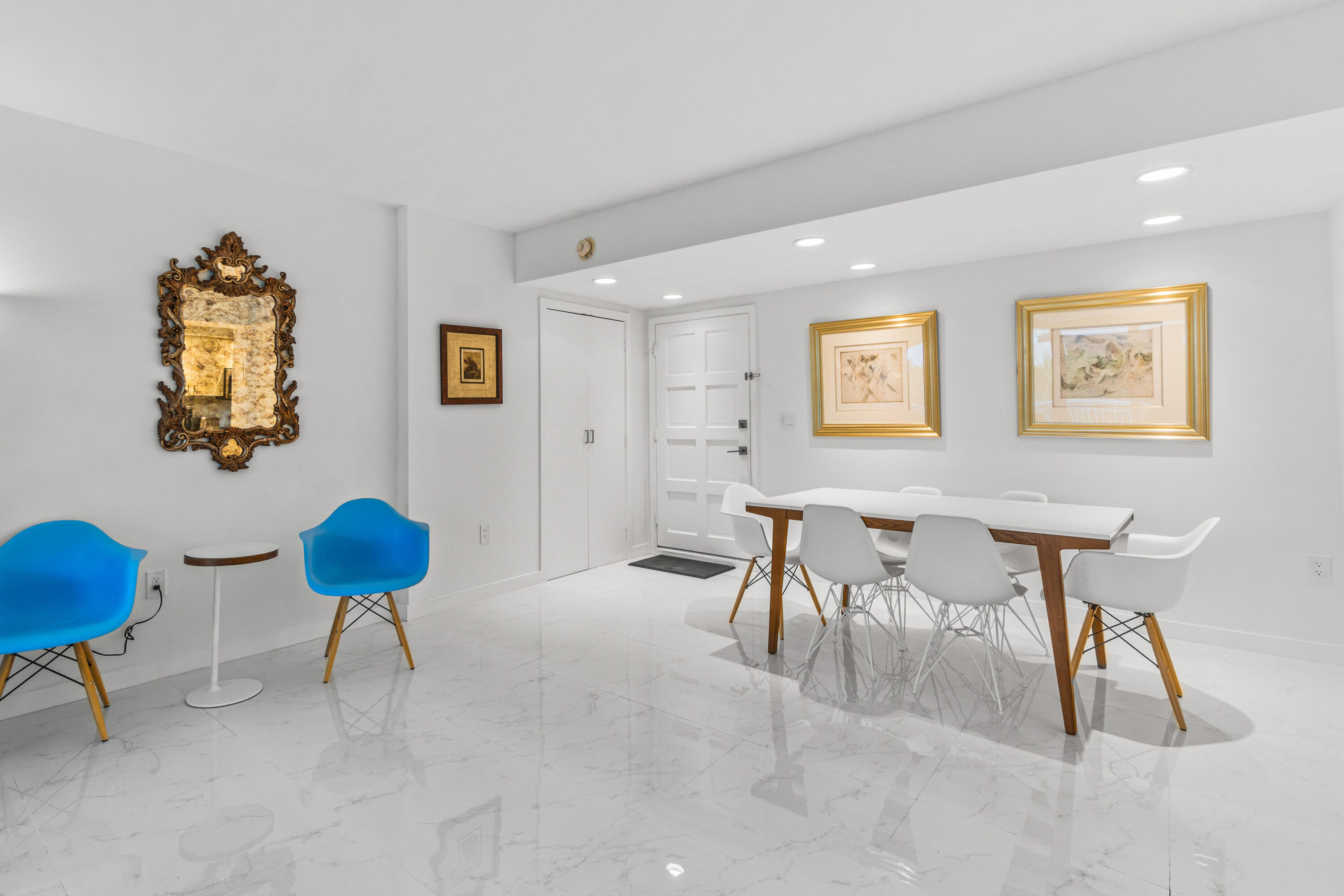 2780 South Ocean Boulevard, Unit 306 Palm Beach, FL 33480 - Photo 8 of 37 a living room with furniture and a lamp