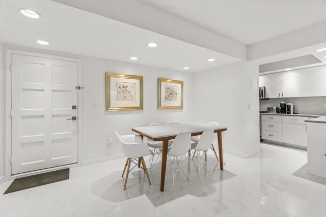 a view of a dining room with furniture