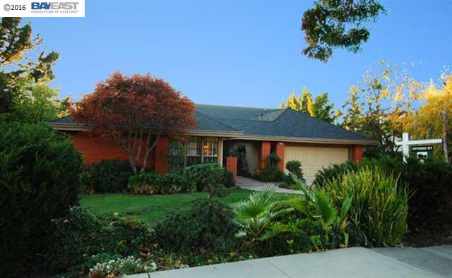47397 Rancho Higuera Road Fremont, CA 94539 - Photo 1 of 1 a front view of house with a garden