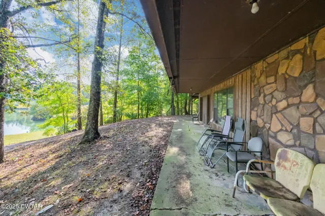 a view of a backyard with garden