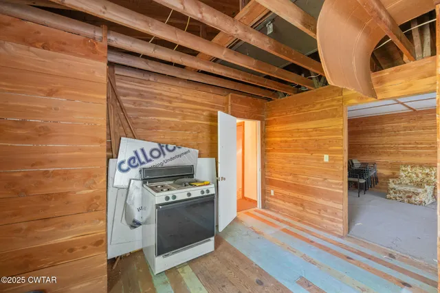 a kitchen with a stove and a microwave