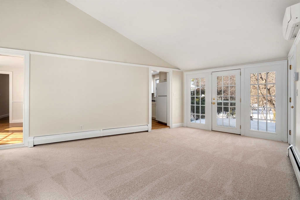 101 Adams Road Concord, MA 01742 - Photo 12 of 26 an empty room with windows